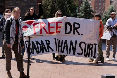 Georgetown University students hold a banner in support of Badar Khan Suri. AP