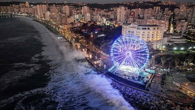 Aerial view of heavy tidal waves in Viña del Mar, Chile, taken on December 28, 2024. The Chilean National Disaster Prevention and Response Service issued a preventive early warning due to the development of abnormal waves on the continental coastal edge of Chile. (Photo by Javier TORRES / AFP)