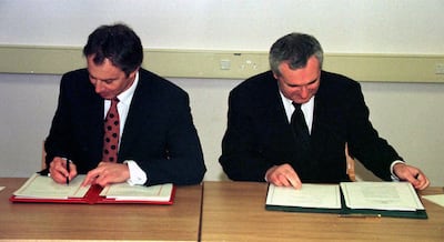 Tony Blair, the British prime minister at the time, left, and Bertie Ahern, Taoiseach at the time, sign the Good Friday peace agreement, which stated that the people of Northern Ireland will decide their own future. PA