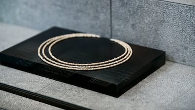 A bead necklace from 3000 BC, which is made of chalk from Ajman's Al Muweihat.