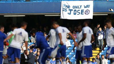 Chelsea fans display a banner in support of their manager Jose Mourinho. Justin Tallis / AFP