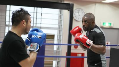 Idris Elba, right, during a sparring session in Idris Elba: Fighter. Courtesy Discovery Communications