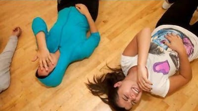 Diala, left, and Maya at the Laughter Yoga class at Ductac, Mall of the Emirates. Jaime Puebla / The National