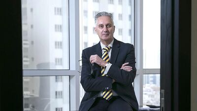 Malcolm Bell is a managing partner at Acuma, where he advises his clients on how and where they should invest their money. Silvia Razgova / The National