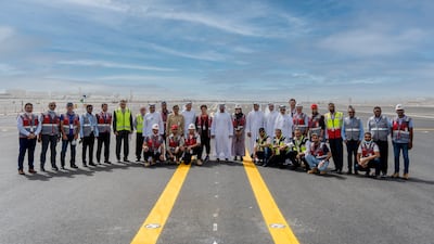 Sheikh Ahmed bin Saeed, president of Dubai Civil Aviation and chairman of Dubai Airports, pictured with team members carrying out the repair work. More than 400 engineers and experts and about 3,800 people are involved in the project.