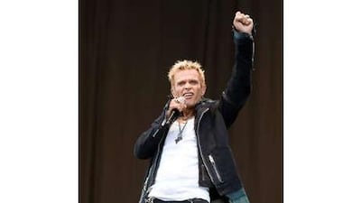 Billy Idol's performance on day three of Download was met with heavy rain.