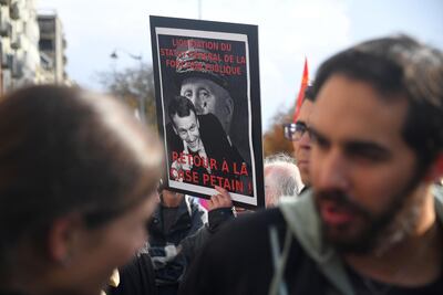 French President Emmanuel Macron was criticised for paying tribute to Petain. Damien Meyer / AFP