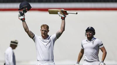Ben Stokes, left, reacts as he makes a hundred runs, with Jonny Bairstow, right, during their second cricket Test against South Africa in Cape Town, South Africa, Sunday, Jan. 3, 2016. Schalk van Zuydam / AP Photo