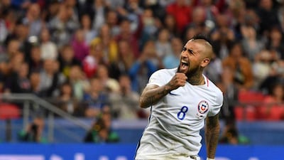 Chile's midfielder Arturo Vidal reacts after scoring in the penalty shoot out during the 2017 Confederations Cup semi-final football match between Portugal and Chile at the Kazan Arena in Kazan on June 28, 2017. AFP