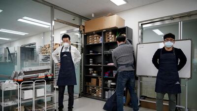 A professor of Pusan National University Park Hyun who used to be a coronavirus patient, prepares to work at Pusan National University in Busan, South Korea. Reuters