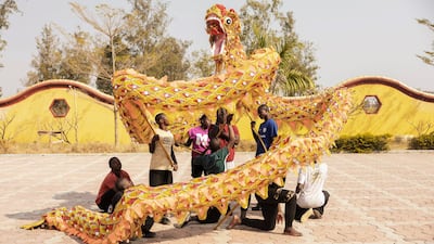 Shaolin students train for a dragon dance, at a temple outside Lusaka, Zambia. AFP