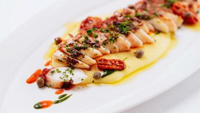 The octopus is served sliced after being roasted.