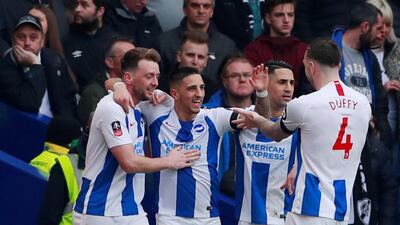 Brighton's Anthony Knockaert celebrates with teammates after scoring their first goal against Derby. Reuters