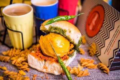 A vada pao served with red and green chutneys from O'Pao. O'Pao