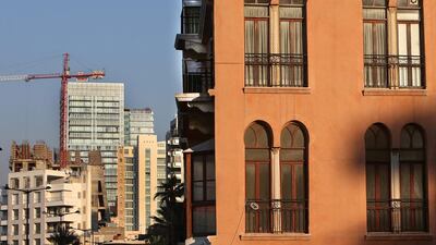 Tall buildings stick out at odd lengths and angles, wedged almost wall to wall between older buildings and sprouting out of alleys.