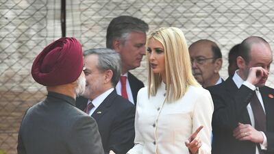 White House senior advisor Ivanka Trump in a classic white silk jacket by Mumbai-based, vegan and environmentalist designer Anita Dongre. AFP