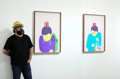 Saher Nassar next to his Target series. Khushnum Bhandari / The National