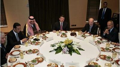 Jordan's King Abdullah, centre, meets with Arab foreign ministers at the Royal Palace in Amman.