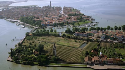 Venissa, a vineyard resort on the adjoining island of Mazzorbo, is linked to Burano by a wooden bridge. Photo: Nevio Doz