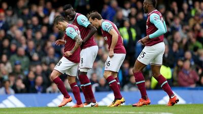 Manuel Lanzini (1st L) of West Ham United celebrates scoring his team’s first goal with his team mates Cheikhou Kouyate (2nd L), Mark Noble (2nd R) and Diafra Sakho (1st R) during the Premier League match between Chelsea and West Ham United at Stamford Bridge on March 19, 2016 in London, United Kingdom. (Photo by Alex Morton/Getty Images)