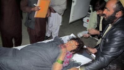 A wounded Afghan girl is rushed to hospital in Helmand province on December 31, 2014. Afghan army mortar rounds killed an estimated 35 civilians and wounded another 70 attending a wedding party in Sangin district. Picture taken on December 31, 2014. Abdul Malik/Reuters