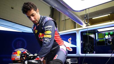 Daniel Ricciardo of Red Bull Racing gets into his car in the garage during F1 winter testing on Sunday in Jerez, Spain. Mark Thompson / Getty Images