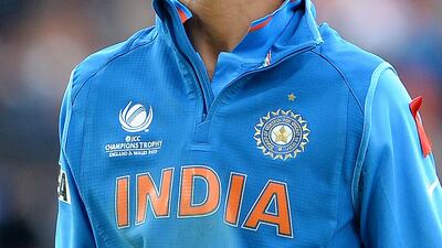 But by the time play resumed, the India batsmen had lost their rhythm. Rohit was dismissed before Dhawan, seen here, was sent back to the pavilion. Andrew Yates / AFP