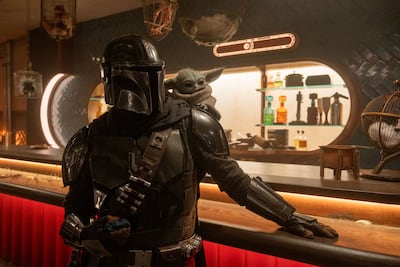 Pedro Pascal plays The Mandalorian alongside Grogu in the film. Photo: Lucasfilm