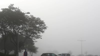 Early morning fog in Discovery Gardens area in Dubai. Pawan Singh / The National