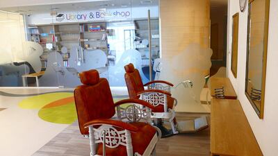 View of the mock barber shop at Sanad Village.