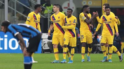 Fati (R)celebrates his goal with his team-mates. Getty