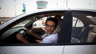 Kareem Shaheen learns how to parallel park, albeit slowly, in one of his lessons at the Emirates Driving Company in Musaffah.