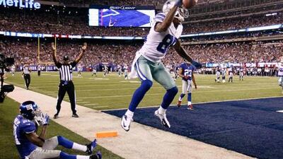 Dallas Cowboys wide receiver Kevin Ogletree celebrates his second touchdown against the NY Giants.