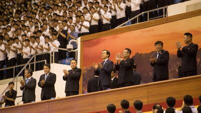 Ri Son Gwon, chairman of the Committee for the Peaceful Reunification of the Country, and South Korean Unification Minister Cho Myoung-gyon watch the clash. Reuters