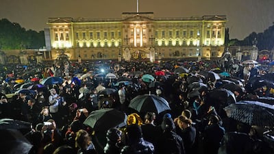 People outside Buckingham Palace in London after the announcement of the death of Queen Elizabeth II. AP