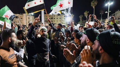 Syrians in Idlib gather during celebrations after a court sentenced ousted president Bashar Al Assad and officials who served under his rule to death. Reuters