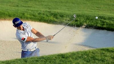 Rafa Cabrera-Bello of Spain plays his third shot at the par-5, 18th hole during the third round of the DP World Tour Championship at Jumeirah Golf Estates, Dubai. David Cannon / Getty Images