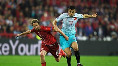 Jaroslav Plasil of Czech Republic tackles Burak Yilmaz of Turkey during the UEFA EURO 2016 Group D match between Czech Republic and Turkey at Stade Bollaert-Delelis on June 21, 2016 in Lens, France. (Photo by Mike Hewitt/Getty Images)