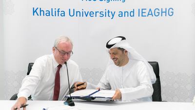 John Gale (left), general manager of the International Energy Agency's programme, and Dr Arif Sultan Al Hammadi, executive vice-president of Khalifa University. Reem Mohammed / The National