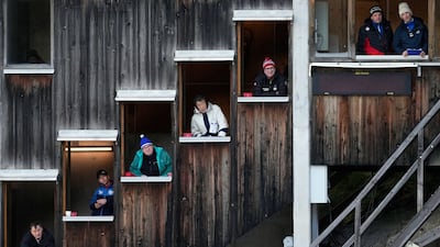 Judges watch the men's Individual Gundersen Normal Hill/10km event at the Nordic Combined World Cup, in Ramsau am Dachstein, Austria. AP
