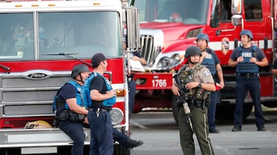 Fire and law enforcement officers gather. EPA