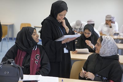 Omani students attend a lecture at the Oman Tourism College. Sebastian Castelier for The National