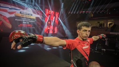 Russia's Farkhod Rakhmonaliev walks to the cage at the Jiu-Jitsu Arena in Abu Dhabi.