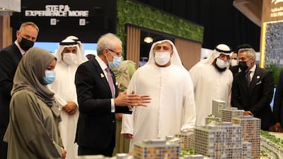 Mattar Al Tayer, director general, chairman of the board of executive directors of the Roads and Transport Authority and commissioner general for infrastructure, urban planning and well-being (centre) after the inauguration of Cityscape Global.
