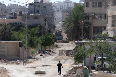 An Israeli army bulldozer demolishes buildings during an Israeli military operation in the Tulkarem refugee camp, July 7, 2025. EPA