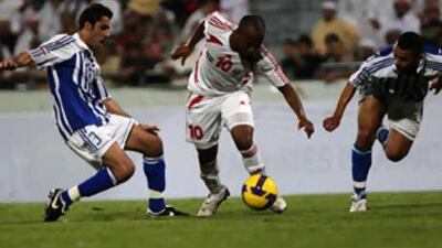 Matar, centre, takes on the Kuwait defence.