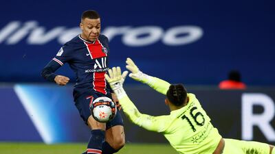 Paris St Germain's Kylian Mbappe scores their first goal against Montpellier. Reuters