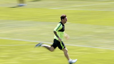 Barcelona's Lionel Messi runs during a training session open to the media on Tuesday ahead of Saturday's Champions League final in Berlin. Albert Gea / Reuters