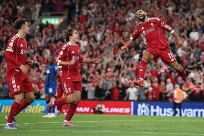 Mohamed Salah celebrates scoring Liverpool's fourth goal alongside Federico Chiesa and Curtis Jones. Getty Images