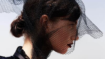 Decked out: Jacket, Dh10,321, Dolce & Gabbana at The Outnet. Blouse, Dh8,865, Chloé. Net, stylist’s own.